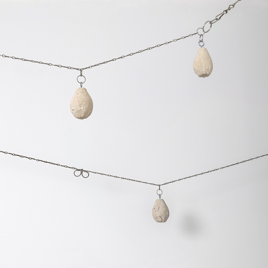 GARLAND Ι, 2024 | calcarenite stone Pachna formation / metal chain / variable dimensions