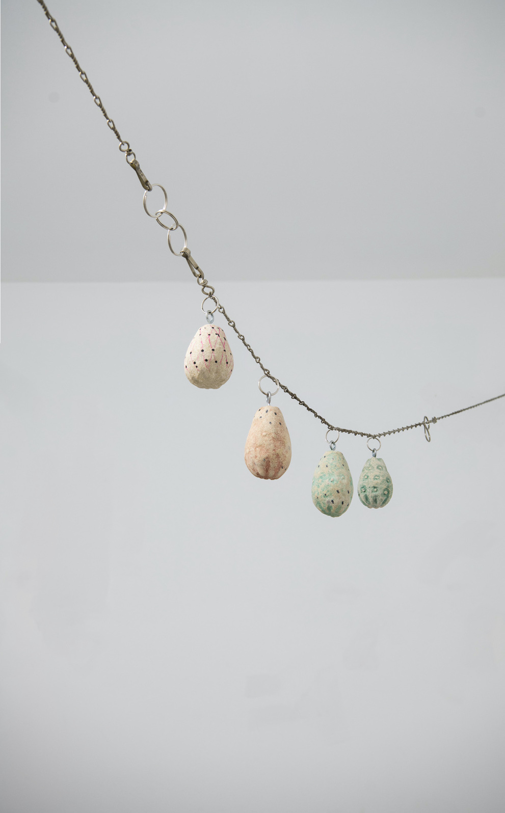 GARLAND IIΙ, 2024 | calcarenite stone Pachna formation / metal chain / variable dimensions